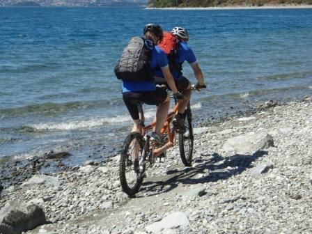 Dad and Anna Riding the Wakatipu Shoreline towards Cecil Peak